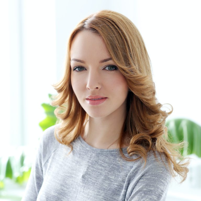 Lifestyle. Beautiful woman in the office